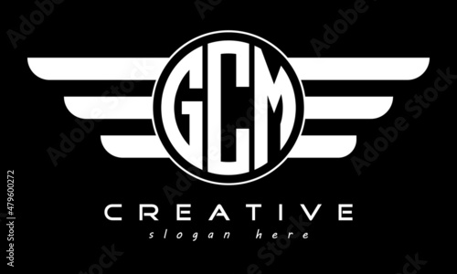 GCM three letter monogram type circle letter logo with wings vector template. photo