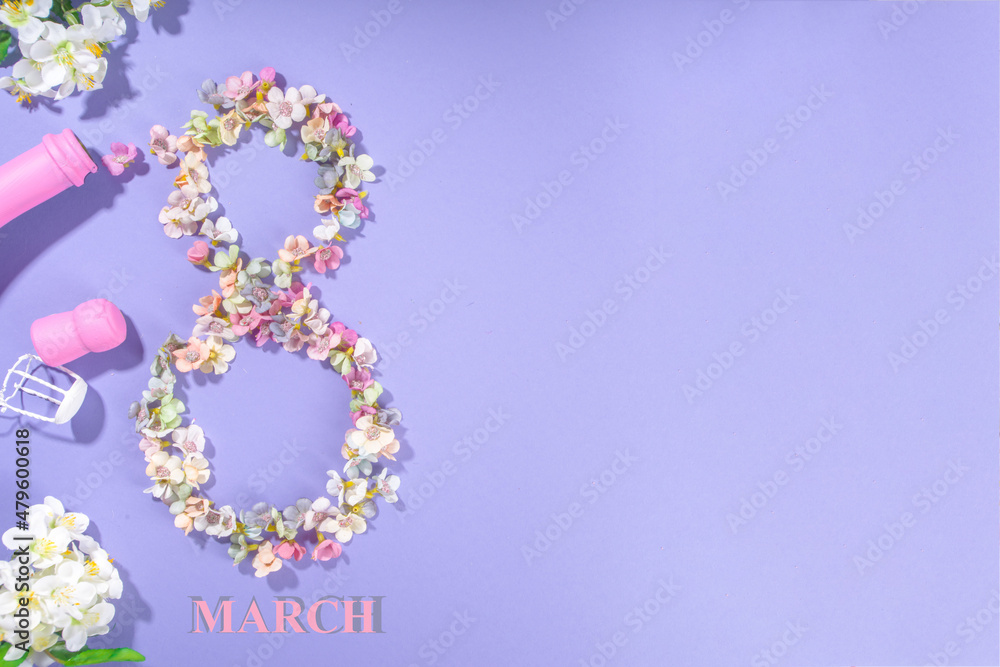 8 march spring holiday background with 8 march made with spring blossom flowers, pink colored champagne bottle, on violet very peri color background flatlay copy space