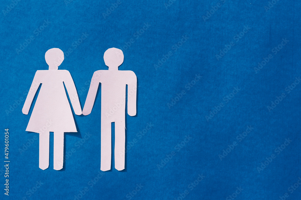Happy Human Couple Paper Craft Mockup on Blue background. Origami Papercraft decorative shapes and figure. Copy Space. Happy Human Couple Paper Craft Mockup on Blue background. Origami Papercraft decorative shapes and figure. Copy Space.