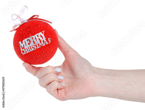 Christmas toy ball in hand on white background isolation