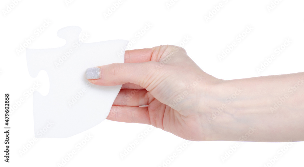 White puzzle in hand on white background isolation White puzzle in hand on white background isolation