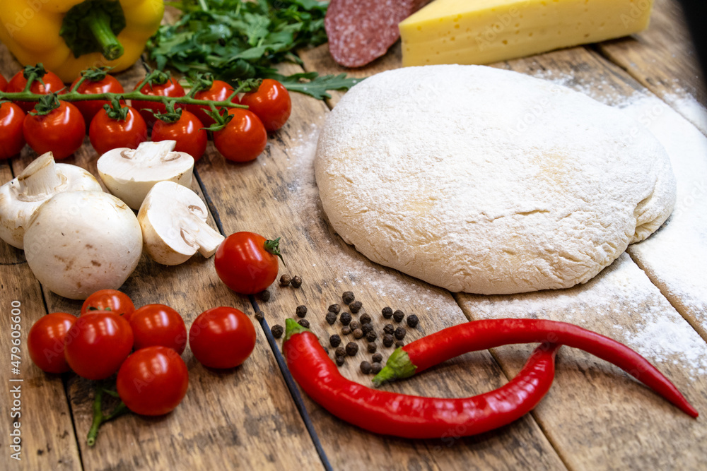 ingredients for making pizza, before baking, on a wooden table, top view, step-by-step recipe ingredients for making pizza, before baking, on a wooden table, top view, step-by-step recipe