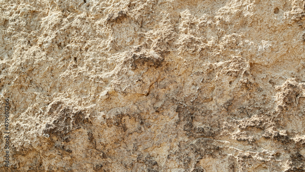 Natural texture sandstone, sun lighting, stone background Natural texture sandstone, sun lighting, stone background