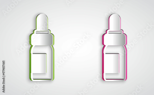 Paper cut Essential oil bottle icon isolated on grey background. Organic aromatherapy essence. Skin care serum glass drop package. Paper art style. Vector