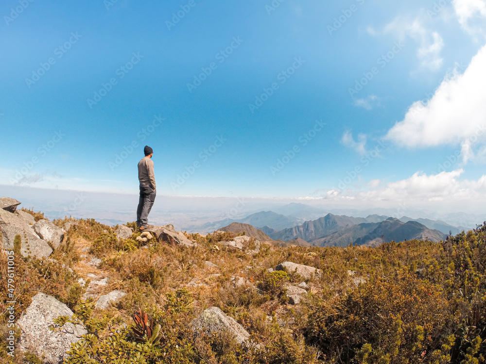 Person looking at the landscape over the mountain
