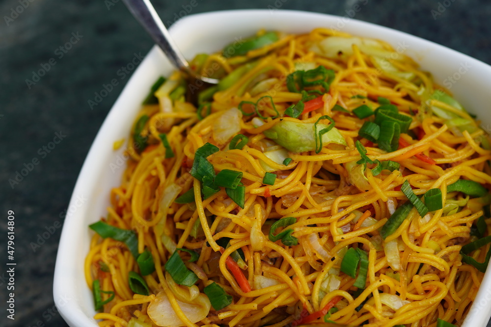 Vegetable Hakka Noodles or ChowMein in white bowl