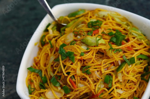 Vegetable Hakka Noodles or ChowMein in white bowl