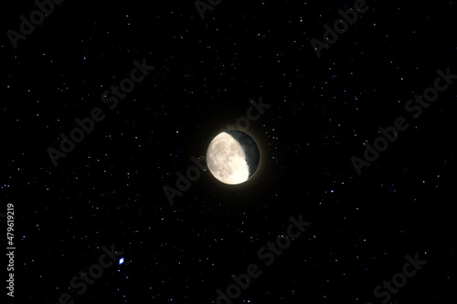 Image of the 3d half moon and starry night sky background in Malaysia.
