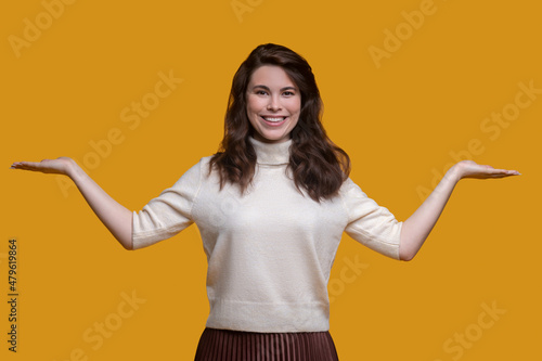 Cute lady with a radiant smile showing the hand gesture