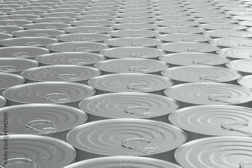closed metallic cans on whi...