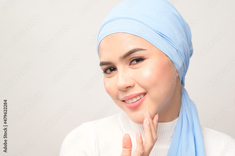 close up of young beautiful muslim woman with hijab isolated on white background studio, muslim beauty skin care concept. close up of young beautiful muslim woman with hijab isolated on white background studio, muslim beauty skin care concept.