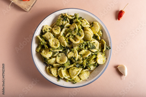 Fresh orecchiette with turnip greens. Typical dish of Puglia, southern Italy. Suitable for those who follow a vegetarian diet photo