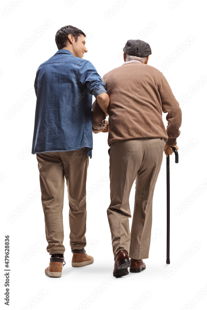 Rear view shot of a young man helping a senior with a walking cane Rear view shot of a young man helping a senior with a walking cane