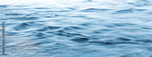 Blue tones water surface as background. © Conny Sjostrom