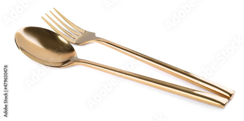 New shiny golden fork and spoon on white background