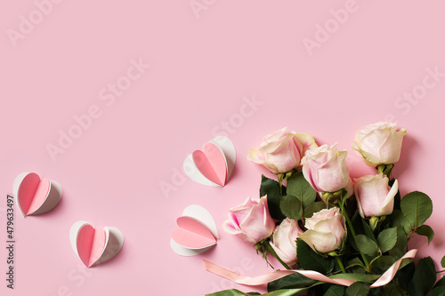 Flat lay with roses on pink background  valentines day and mothers day concept