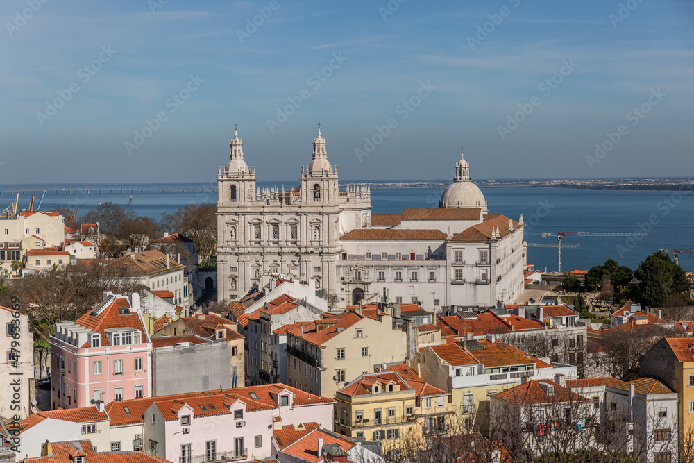 View of a typical Lisbon church and a series of classic houses around