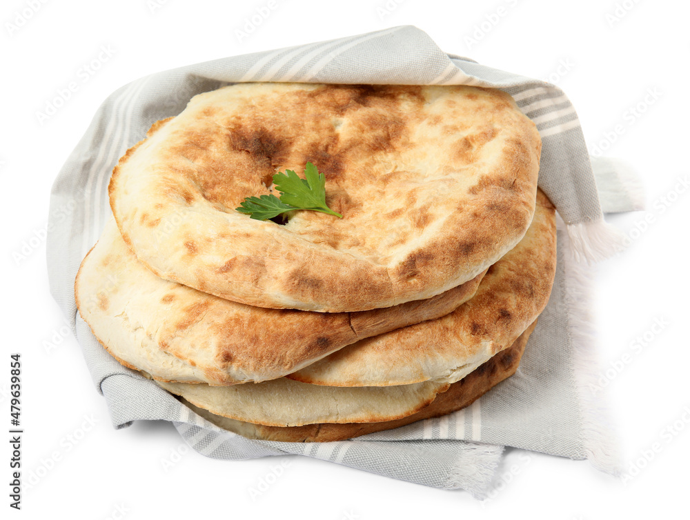 Delicious fresh pita bread with napkin on white background