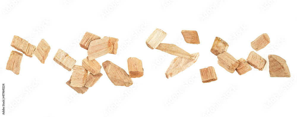 Wood chips isolated on a white background, top view. Wood smoking chips. Wood chips isolated on a white background, top view. Wood smoking chips.