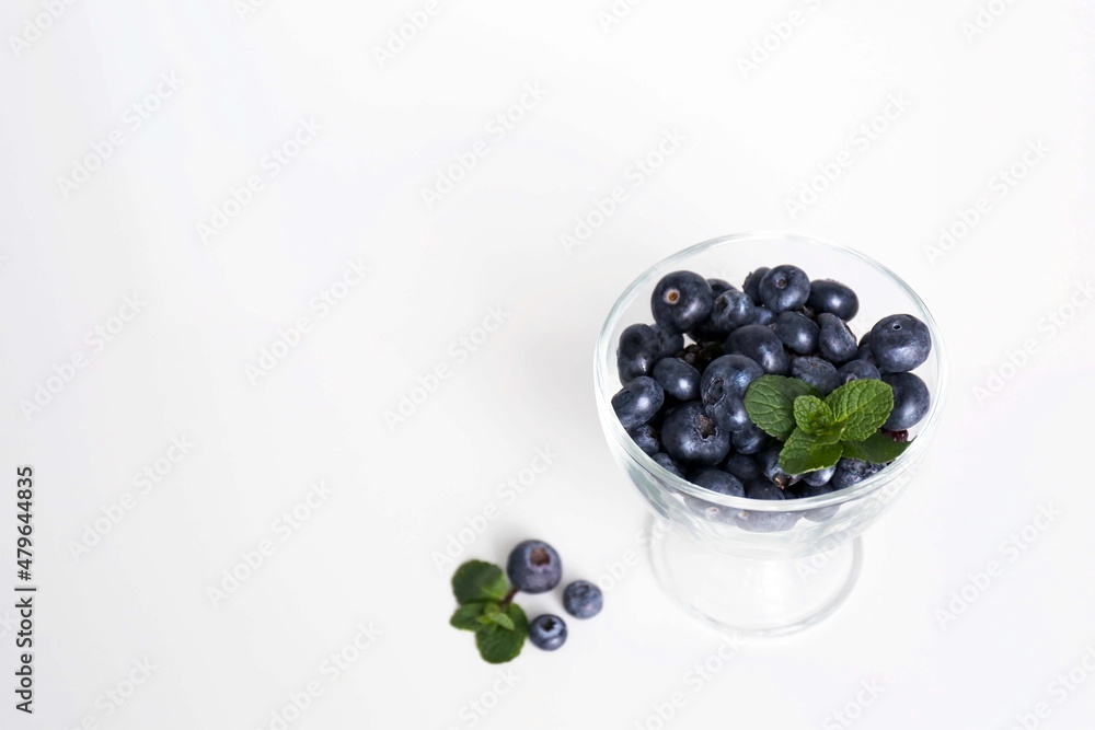 blueberries in a glass bowl blueberries in a glass bowl