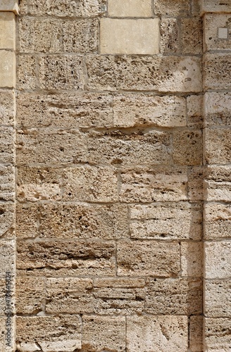 Texture of rough stone wall in ancient temple niche