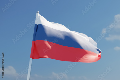 Waving Russian flag on a blue sky background