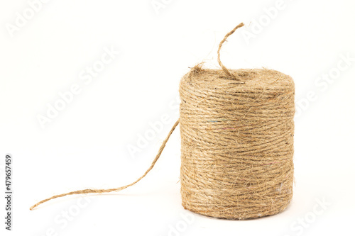 Skein of natural jute twine isolated on white background. Hemp thread