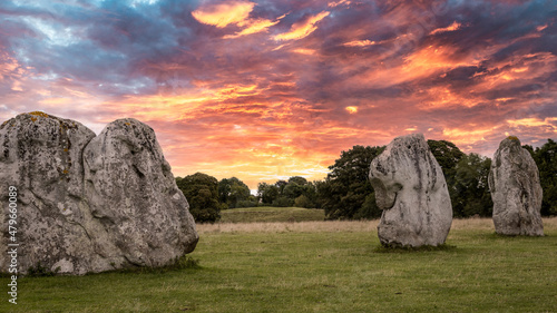 Avebury stone circle at sunrise. Neolithic sarsen sones. Pagan monument. photo