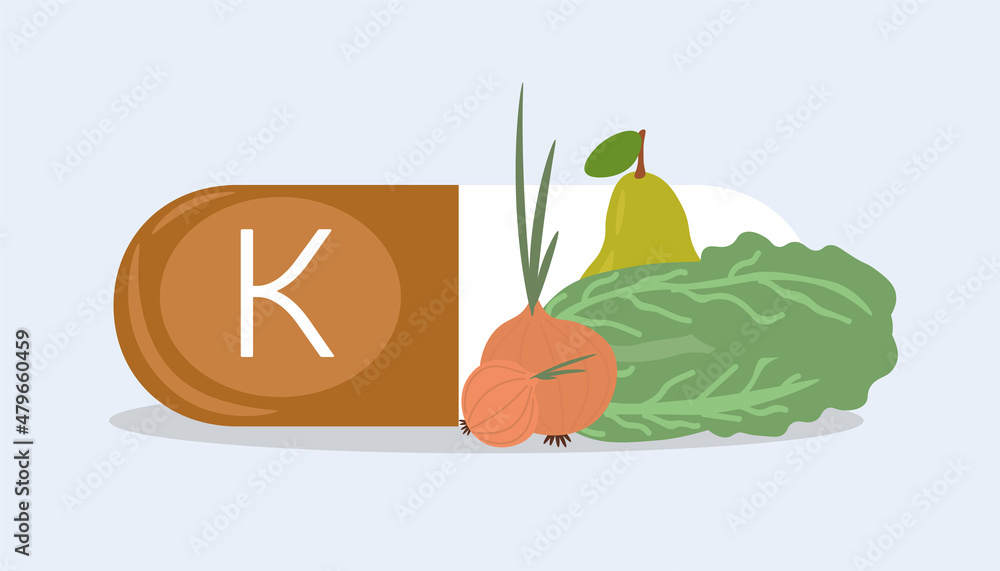 Sources of vitamins concept. Tablet with fat soluble vitamin K, lettuce