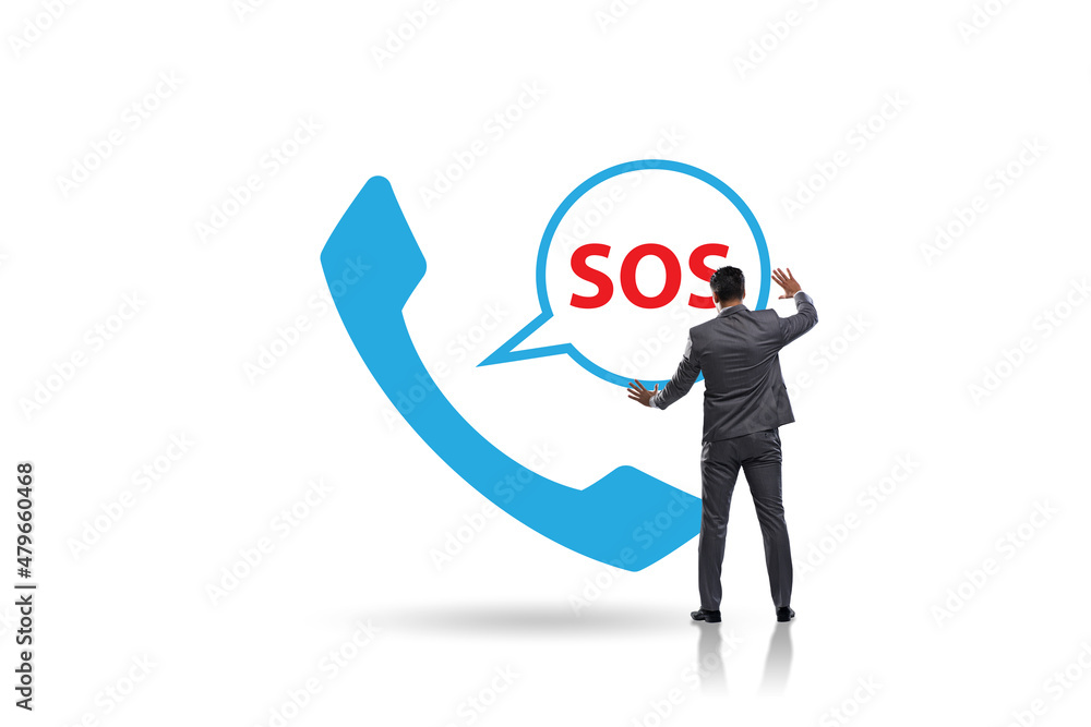 Businessman pressing SOS button in case of danger Businessman pressing SOS button in case of danger
