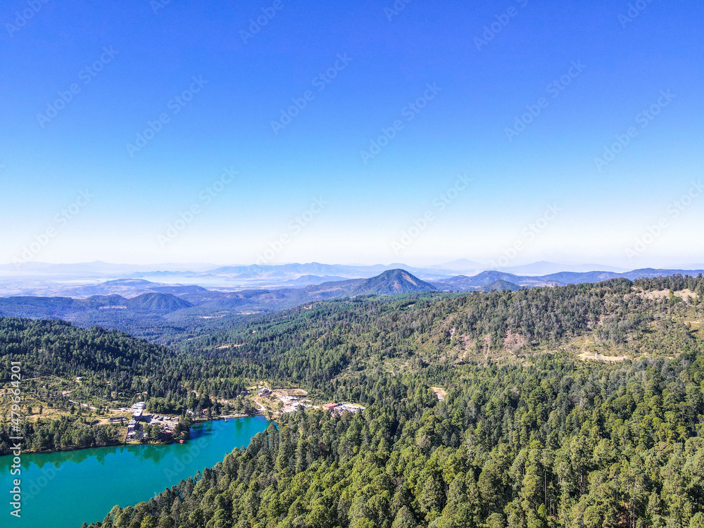 Aerial picture of lake and woods, nice day