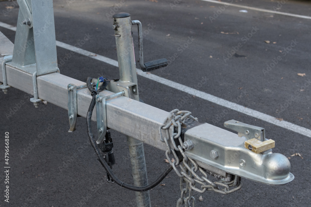 Car tow hitch with trailer lock handle and electrical socket close up