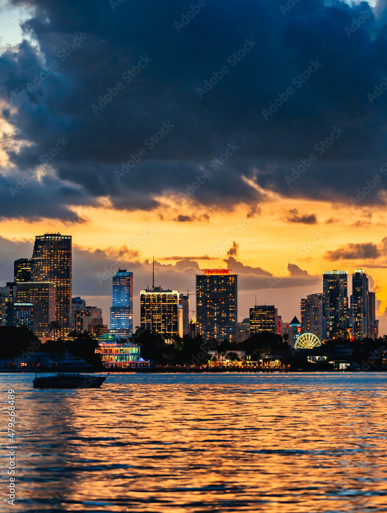 sunset over the city Miami Florida usa buildings skyscrapers sky colors clouds panorama sea boat downtown urban landscape travel 