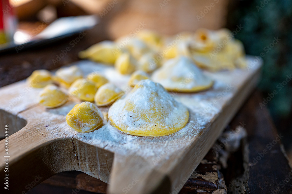 Italian food, fresh home made stuffed pasta tortelli or ravioli dumplings ready to cook, Parma, Emilia Romagna, Italy Italian food, fresh home made stuffed pasta tortelli or ravioli dumplings ready to cook, Parma, Emilia Romagna, Italy