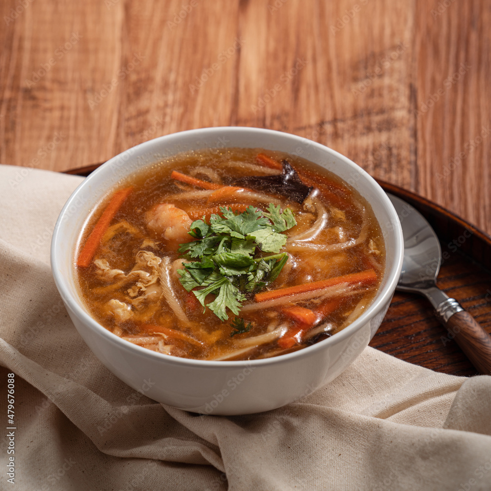 Delicious traditional thick soup with shrimp meat ball and vegetables.