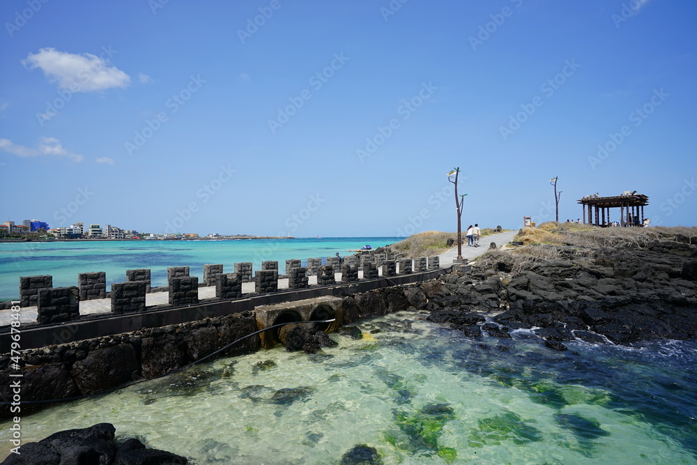 a bridge on the sea and clear water
