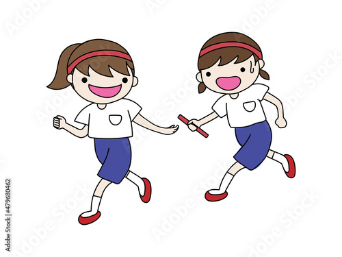 リレーでバトンを渡すシーンの女の子
