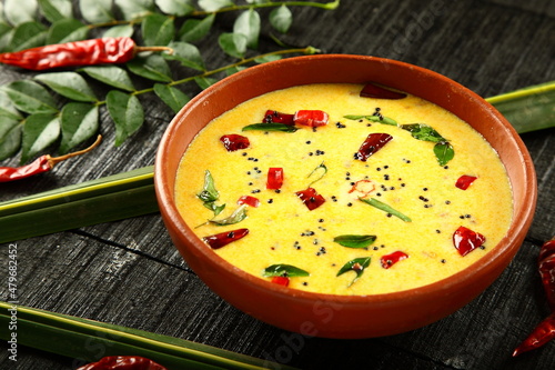 Moru kachiyathu, Kachu moru, spiced buttermilk curry. Kerala recipes background.
