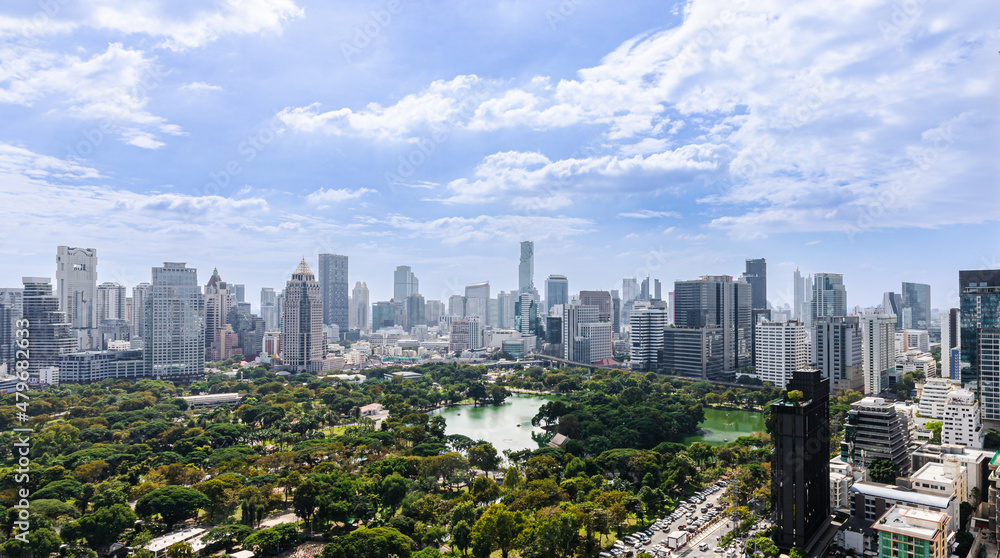 Fototapeta premium Wonderful cityscape at Lumphini Park, Park is a park in Bangkok, Thailand.