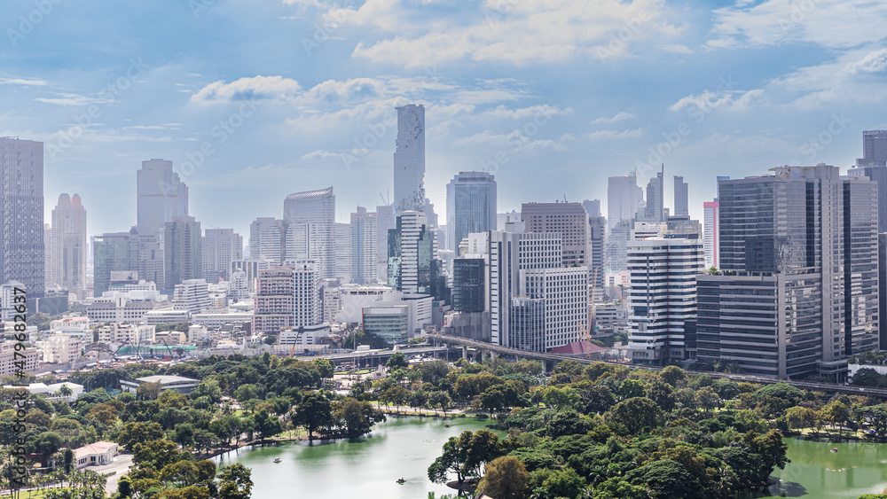Fototapeta premium Wonderful cityscape at Lumphini Park, Park is a park in Bangkok, Thailand.