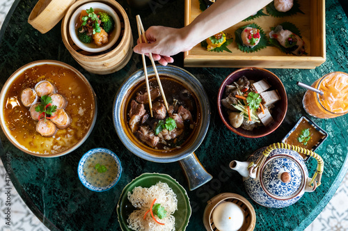 Chinese Yumcha Dimsum Set in bamboo containerr, chinese cuisine , top view photo