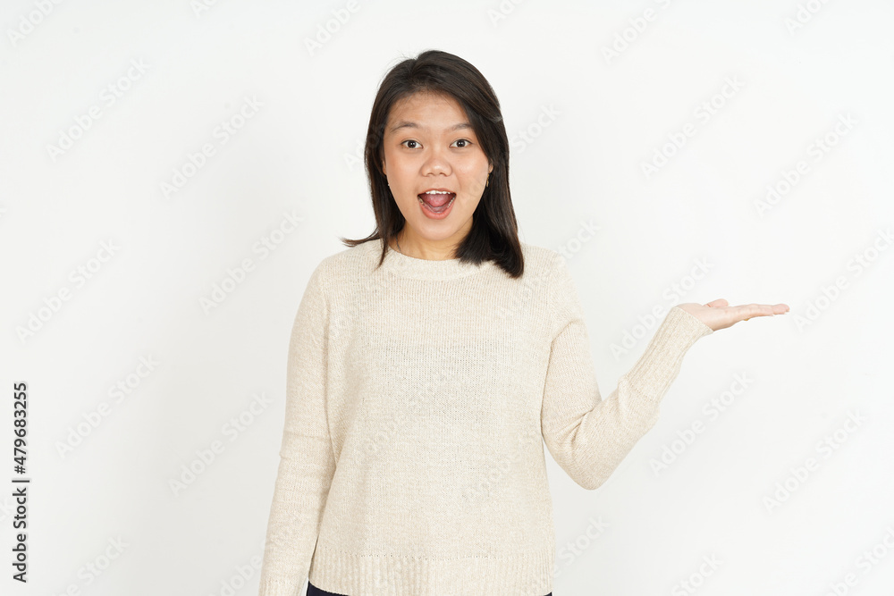 Showing recommended product on open palm of Beautiful Asian Woman Isolated On White Background Showing recommended product on open palm of Beautiful Asian Woman Isolated On White Background