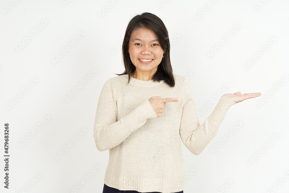 Showing recommended product on open palm of Beautiful Asian Woman Isolated On White Background Showing recommended product on open palm of Beautiful Asian Woman Isolated On White Background