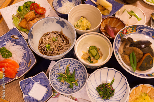 shibu onsen, nagano, japan, 2021-23-10 , Meal at a traditional Ryokan with different dishes of the Japanese cuisine.