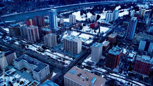 Edmonton 109 St NW and 99 Ave flyover winter snow covered Government and Residential buildings overlooking the downtown city headed South West towards Victoria Valley Park and curvy river university photo