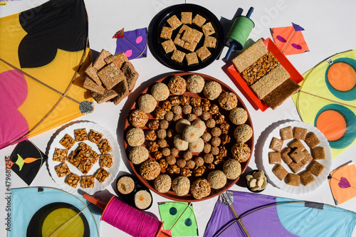 Makar Sankranti festival special sweet dishes made of Jaggery and sesame seeds, peanuts, amaranth seeds, puffed rice. Uttarayan food Til laddu, Til gur chikki, peanut chiki, rajgira laddu photo