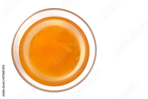 Kombucha in a glass cup on a white background,healthy and delicious drink top view.