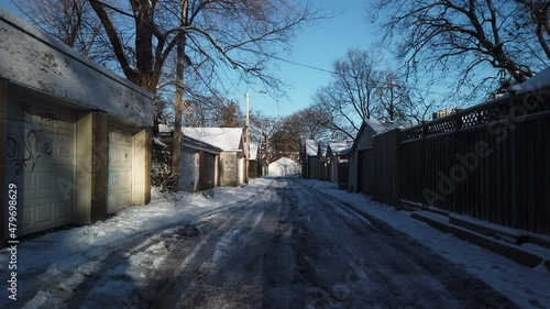 Wallpaper Mural Wide daytime establishing shot of an icy snow covered laneway in Toronto Torontodigital.ca