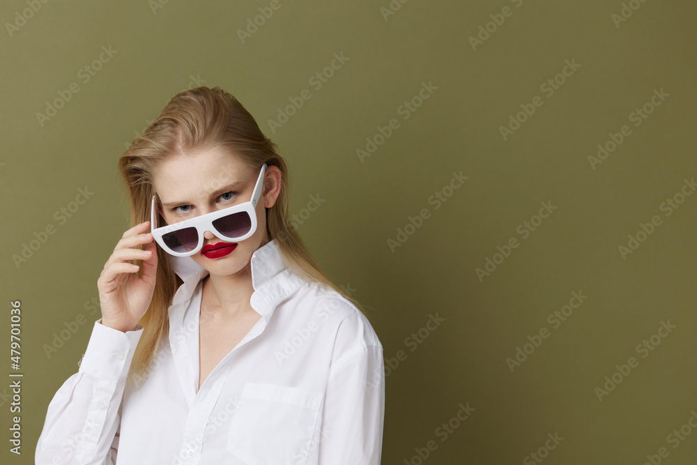 fashionable woman in white shirt sunglasses isolated background