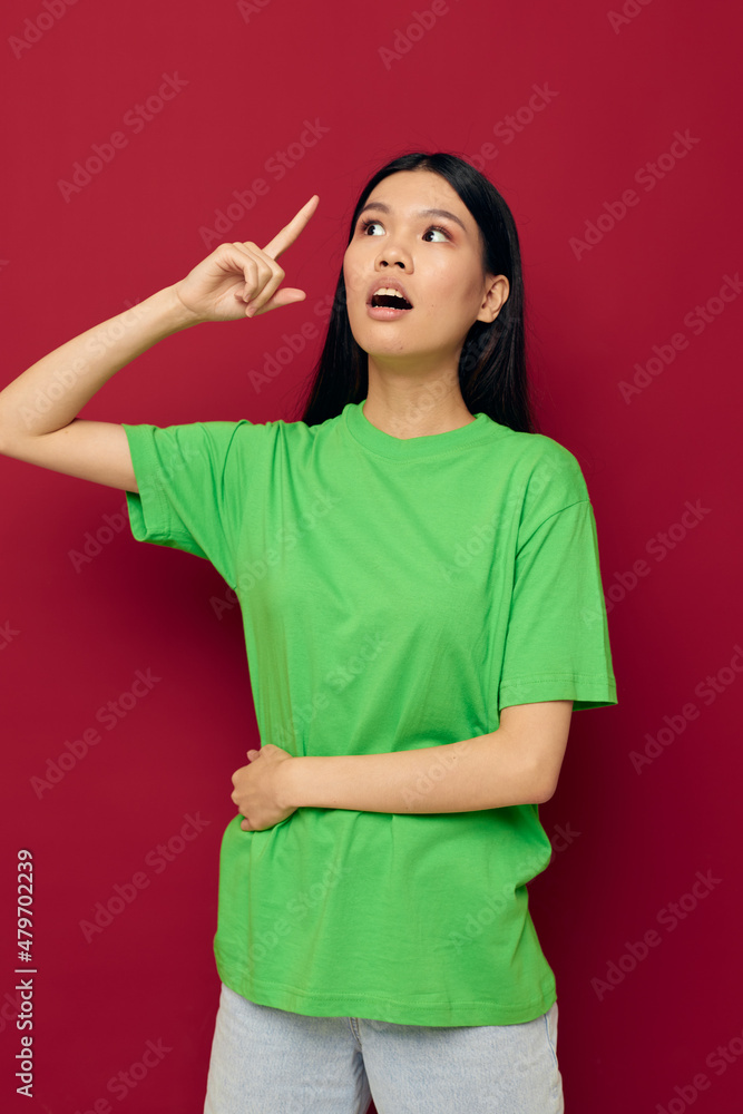 Charming young Asian woman casual wear emotions posing fashion studio model unaltered Charming young Asian woman casual wear emotions posing fashion studio model unaltered